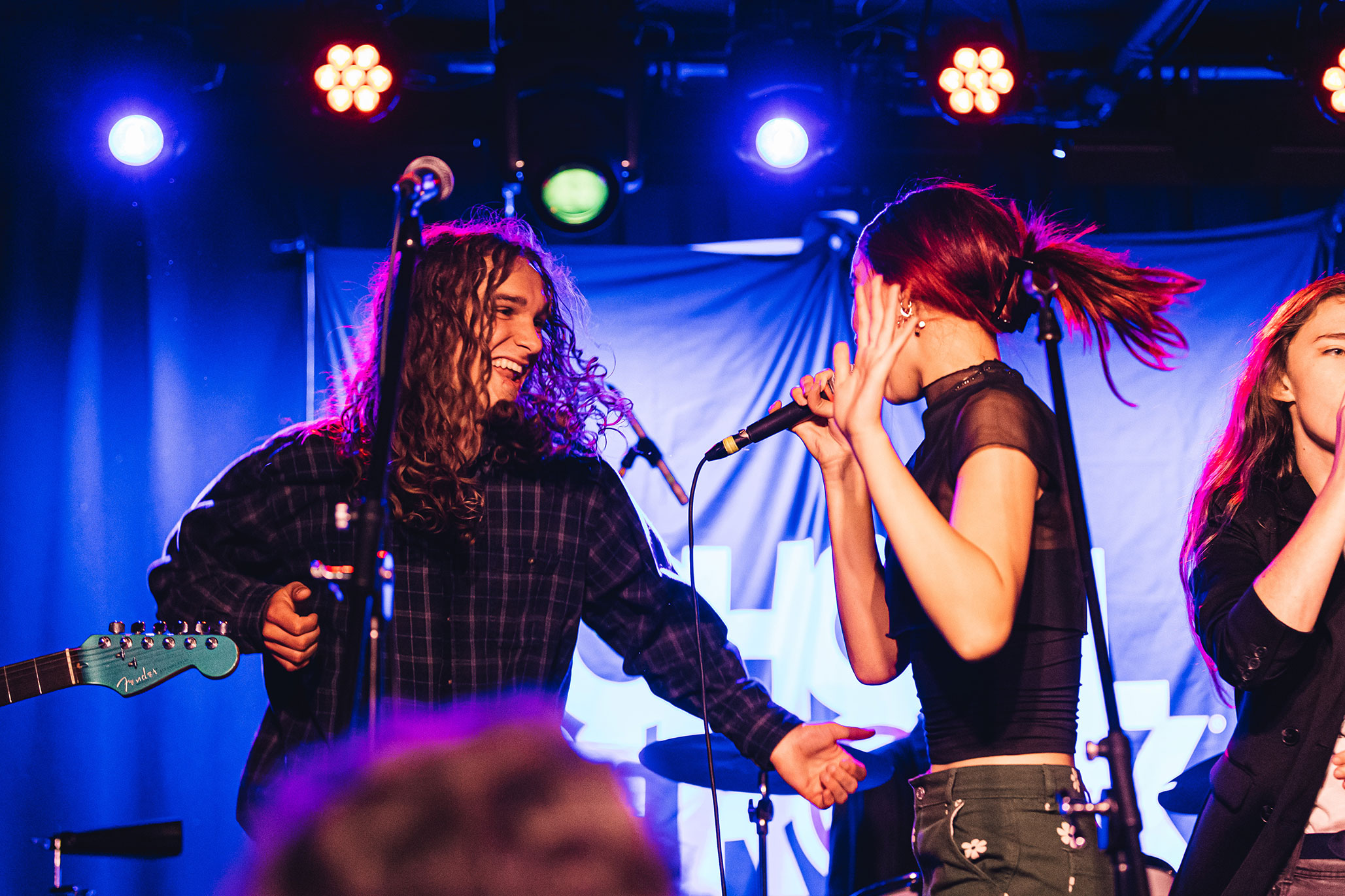 School of Rock students performing on stage