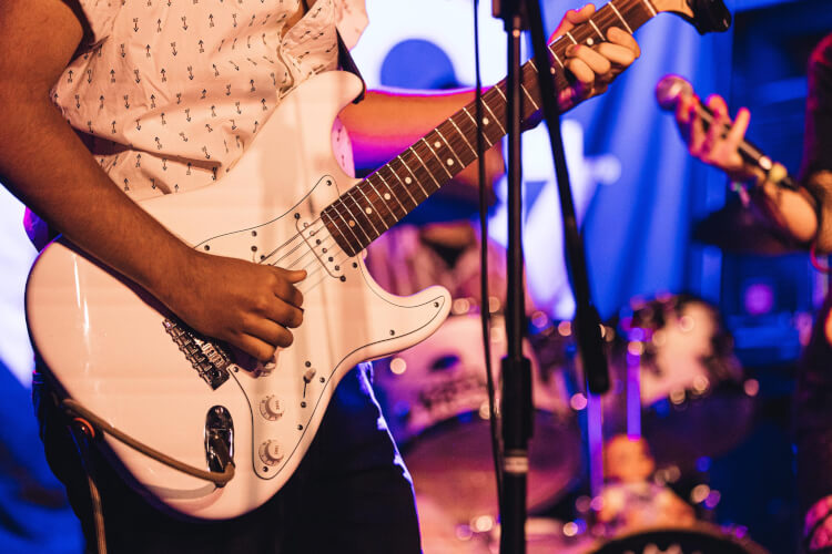 Closeup of a School of Rock student guitarist