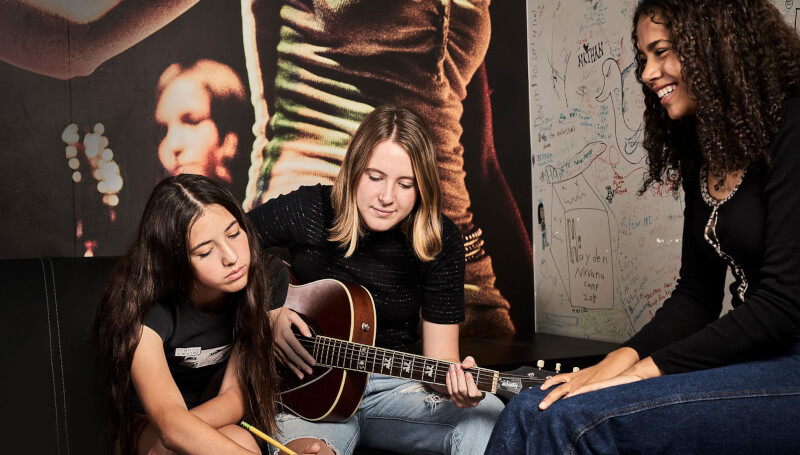 Students working together to write a song